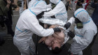 Ukrainian emergency workers wearing hazmat suits conduct training drills in the event of an attack on the Zaporizhzia nuclear power plant.