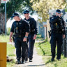Police in Doonside near the location of the fatal stabbing on Saturday morning.