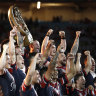 The Roosters celebrate the 2019 grand final win.