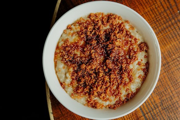 Toasted coconut adds crunch to Toby Wilson’s signature Anzac porridge.