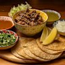 Taco platter with lamb barbacoa.