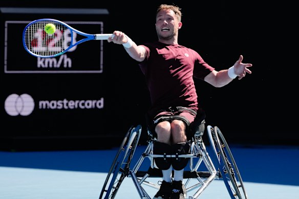 Alfie Hewett, of Britain, plays a forehand return to Japan’s Tokito Oda in the men’s wheelchair final.