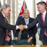 Prime Minister-elect Chris Luxon (centre) with coalition partners, NZ First leader Winston Peters (left) and ACT leader David Seymour.