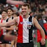Jack Macrae of the Saints high-fives fans earlier this season.
