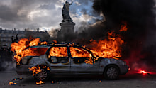 A car set ablaze in Paris.
