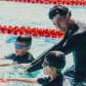 Swim Brothers swimming instructor Omar Affouf with Gaza refugees Adam Murad and Mohammed Al-Bashiti, during their free lesson, at Roselands Leisure & Aquatic Centre. 