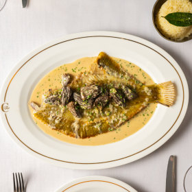 Whole flounder with pilaf. 