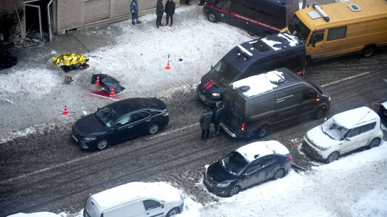 Investigators stand at the site where Igor Kirillov, the head of Russia’s Nuclear, Biological, and Chemical Defense Forces, and his assistant, Ilya Polikarpov, were killed by an explosive device.