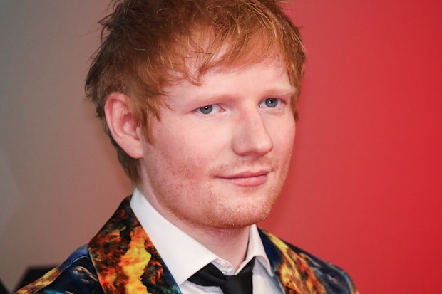 Ed Sheeran poses for photographers upon arrival at the European MTV Awards in Budapest, Hungary, Sunday, Nov. 14, 2021.