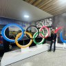 Brisbane 2032 chief executive Cindy Hook with the Olympic rings and agitos.