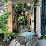 The space below the pergola at ‘Clos du Peyronnet’ in Menton in the South of France is used like a living room
