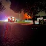 Three children have died, and a woman remains in serious condition under police guard following a fire at a house in Toowoomba on Wednesday morning.