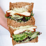Schnitty sandwich with crispy chicken schnitzel, herby mayonnaise, mixed lettuce and caramelised carrot.