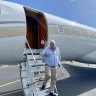Clive Palmer disembarks his private jet to campaign for the United Australia Party in Gladstone.