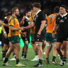 James Slipper of the Australian Wallabies shakes hands with Scott Barrett of the All Blacks