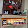 Nira is a hole-in-the-wall coffee shop.