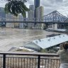The view over a flooded Brisbane River and Howard Smith Wharves.