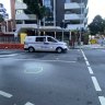 Man dies after being struck by bus in South Brisbane