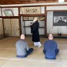 Zen and the art of being tapped with a stick...a monk with a keisaku.