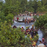 Groups of Rohingya Muslims cross the Naf River at the border between Myanmar and Bangladesh, near Palong Khali, Bangladesh in 2017.