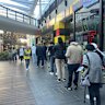 Voters queue at Docklands polling centre.