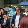 Trans advocates and supporters addressed media outside Brisbane’s Supreme Court after a judge ruled the government’s ban on gender-services in January was unlawful. 