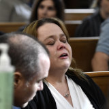 Kyle Rittenhouse’s mother, Wendy Rittenhouse, reacts as the verdicts are read out.