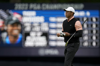 Tiger Woods walks on the green on the 17th hole during the third round of the PGA Championship.
