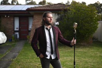 Musician Brett Sams outside his home.