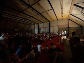 Locals and tourists attend a town hall meeting in Mallacoota on New Year's Day.