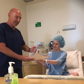 Taylah Keating with Dr Sparks before he performed the surgery that later became the subject of a complaint by a fellow surgeon. 