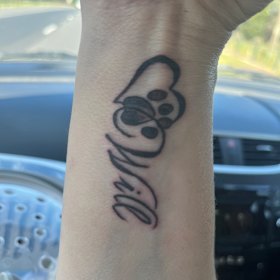 Claire Brookes’ tattoo in memory of her rescue cat Will.