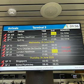 Qantas flight QF33R on the Perth Airport arrivals board after the flight was turned back mid-flight.