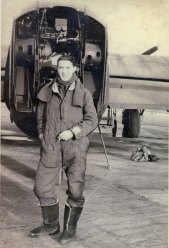 Dambuster rear gunner Ray Wilkinson in front of Lancaster. 