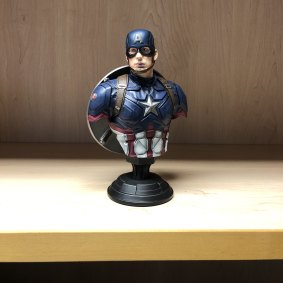 The Captain America figurine.