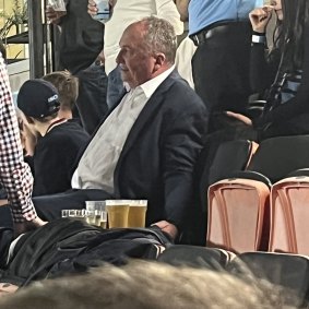Thirsty work: Barnaby Joyce at the rugby.