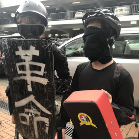 These 15-year-old protesters were dressed to defend themselves during student demonstrations on Monday.