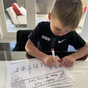 Kindergarten student Hunter Curtis has adapted to home-schooling.