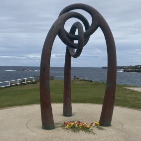 Flowers in memory of those who died, at the Coogee Bali bombs memorial in 2021.