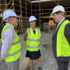Curator Philip Bacon AO (left) with sculptor Lindy Lee and Star Entertainment chief executive Matt Bekier.