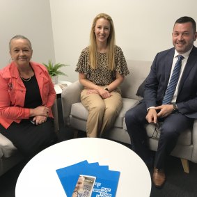 Brindabella Labor MLA Joy Burch, Lifeline Canberra CEO Carrie Leeson and Vikings Group CEO Anthony Hill in the support room at the Erindale Vikings.