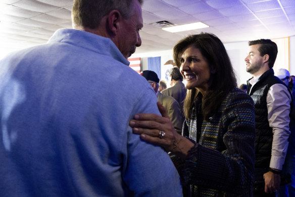 Republican presidential hopeful Nikki Haley talks with voters during a town hall at Vittoria Lodge in Ankeny, Iowa.
