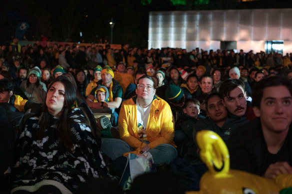 Matildas fans watch the game against Sweden at the Tumbalong Park live site in Sydney.