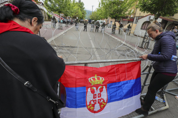 Hundreds of ethnic Serbs on Wednesday gathered at the city hall in Zvecan, northern Kosovo, to try and take over offices where ethnic Albanian mayors had taken up posts.
