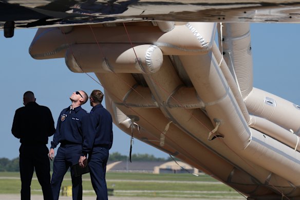 An emergency inflatable slide deployed before President Donald Trump arrived to board Air Force One.