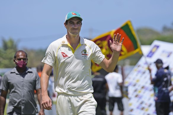 Australian captain Pat Cummins waves to fans after defeating Sri Lanka by 10 wickets in Galle on Friday.