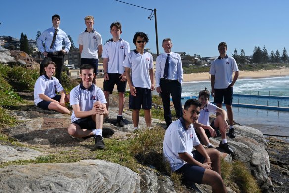 Balgowlah Boys' High deputy principal Benjamin Seldon (left) with principal Paul Sheather and several students.