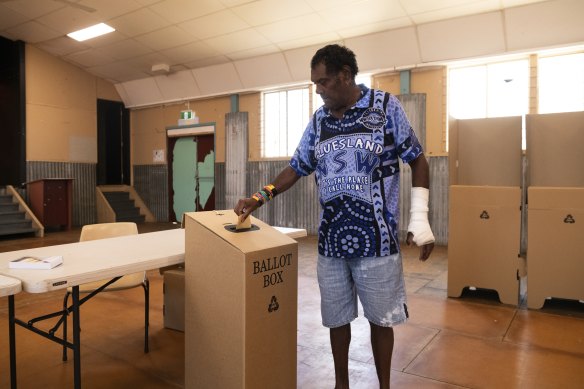 Alfred Murdoch casts his vote at the Cherbourg voting centre in the Queensland seat of Wide Bay. It was one of just three booths in the seat to vote Yes.