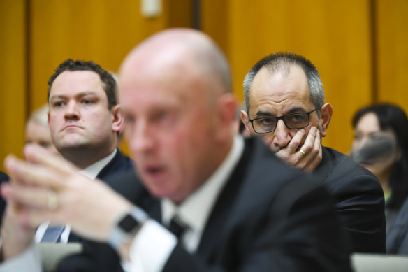 Mike Pezzullo, right, called Australian Federal Police's Deputy Commissioner Neil Gaughan, centre, after a raid on a News Corp journalist's house.