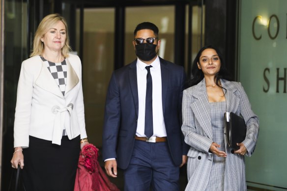 Angelo Dellosa leaves Downing Centre court on Friday with his legal team. 